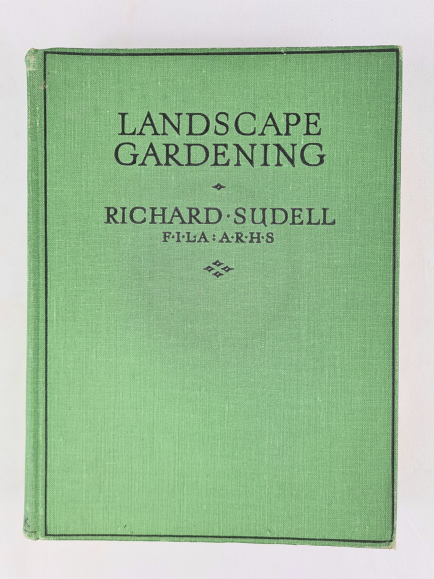 Green antique gardening book.