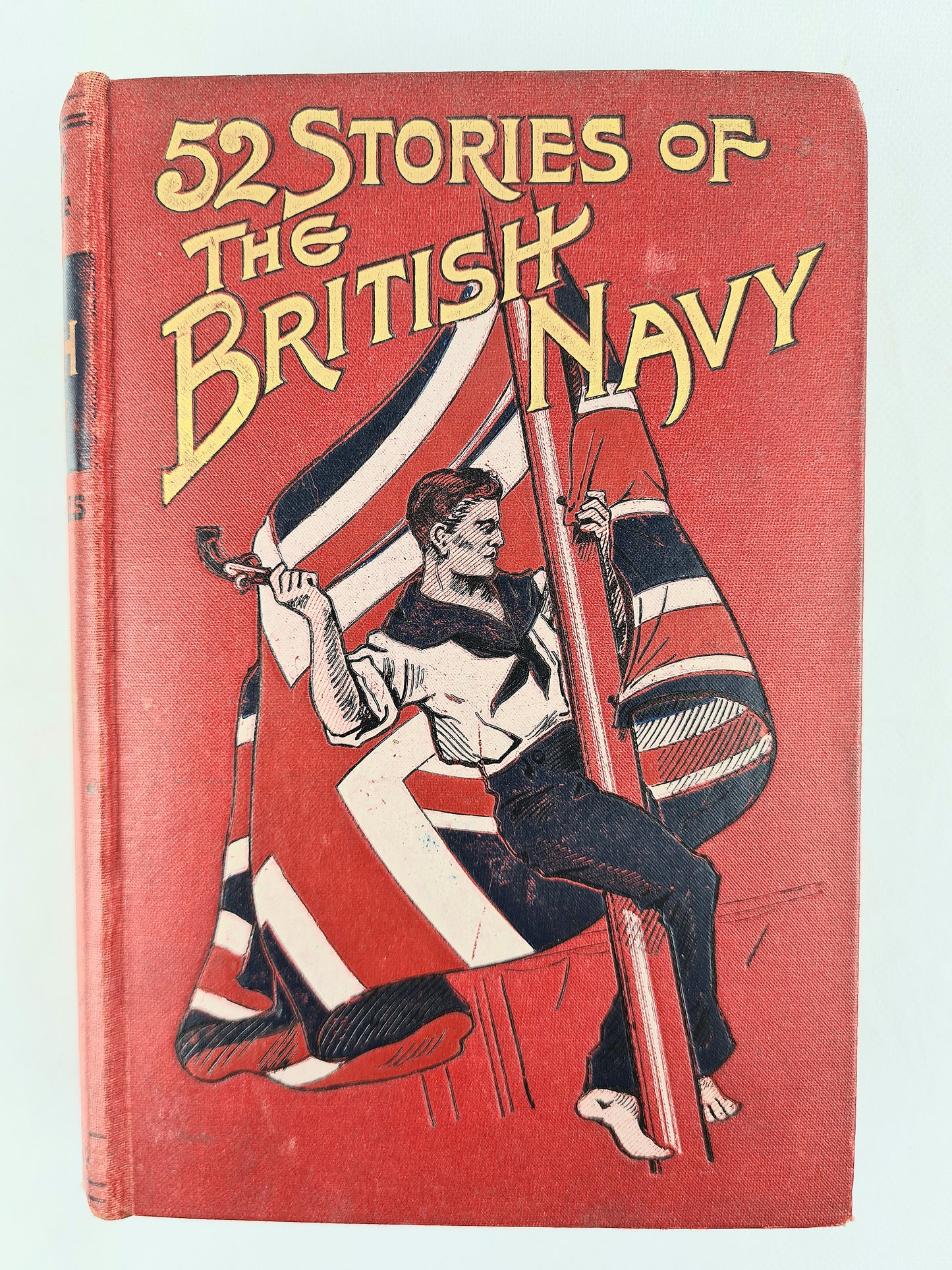 52 stories of the British Navy. Decorative red antique book with a good cover design 