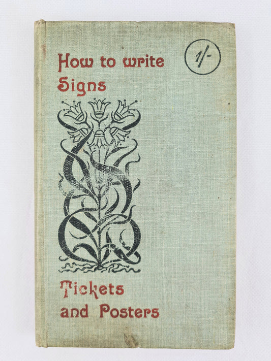 Antique sign writing books with a decorative cover 