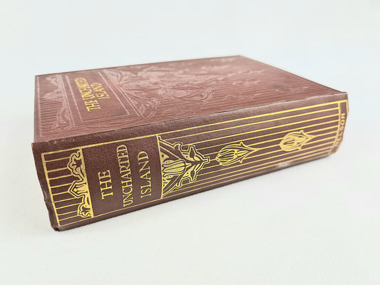 The Uncharted Island. Decorative antique copy with a gilt art nouveau cover design 