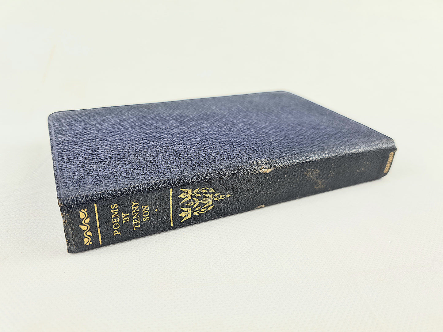 The Petry Of Tennyson. Small blue antique poetry book with gilt lettering 