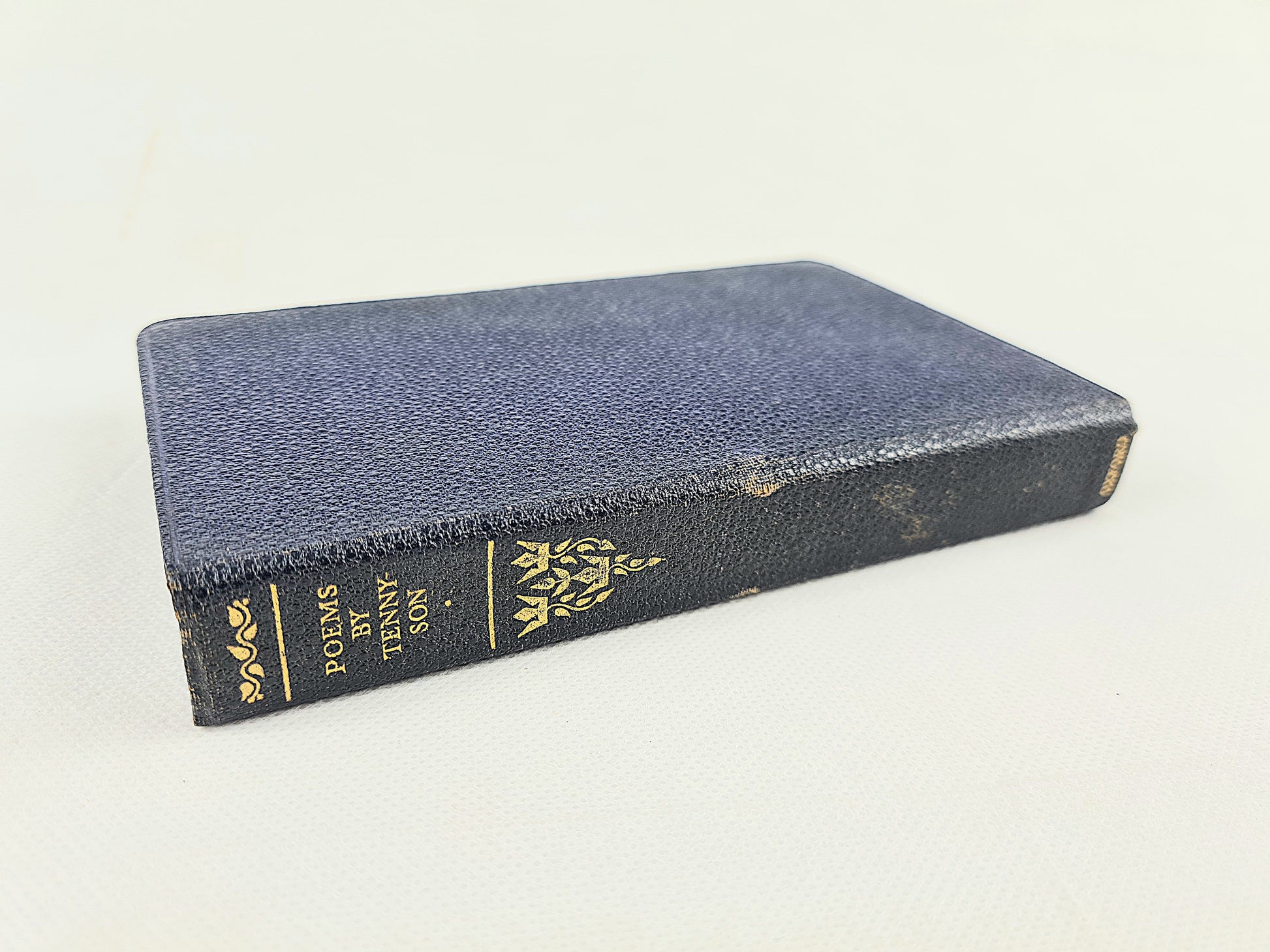 The Petry Of Tennyson. Small blue antique poetry book with gilt lettering 