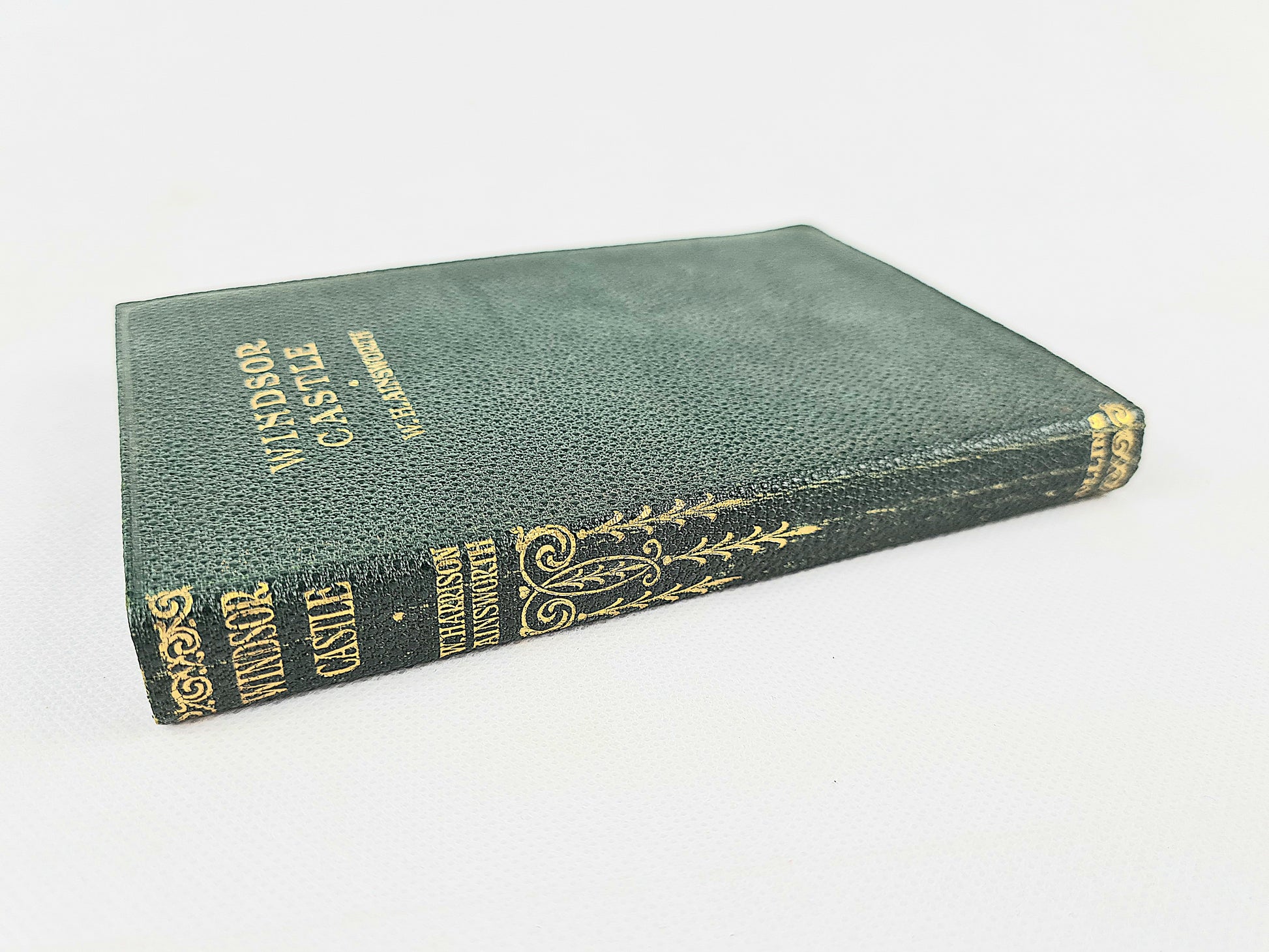 Decorative green and gold antique book