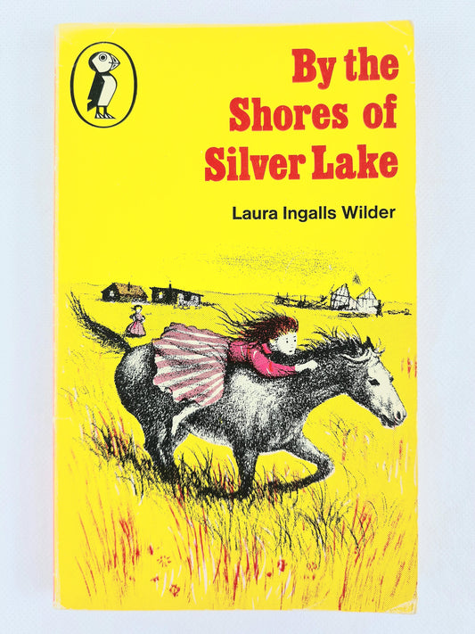 By the shores of silver lake by Laura Ingalls Wilder. Vintage children's book