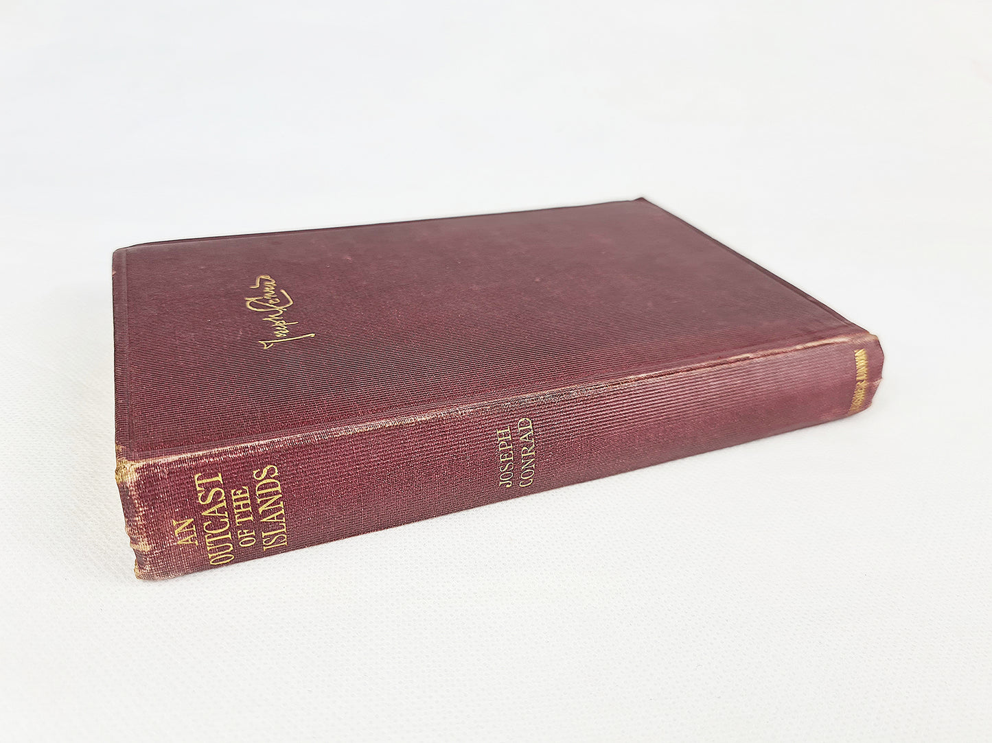 Antique book by Joseph Conrad, outcast of the islands